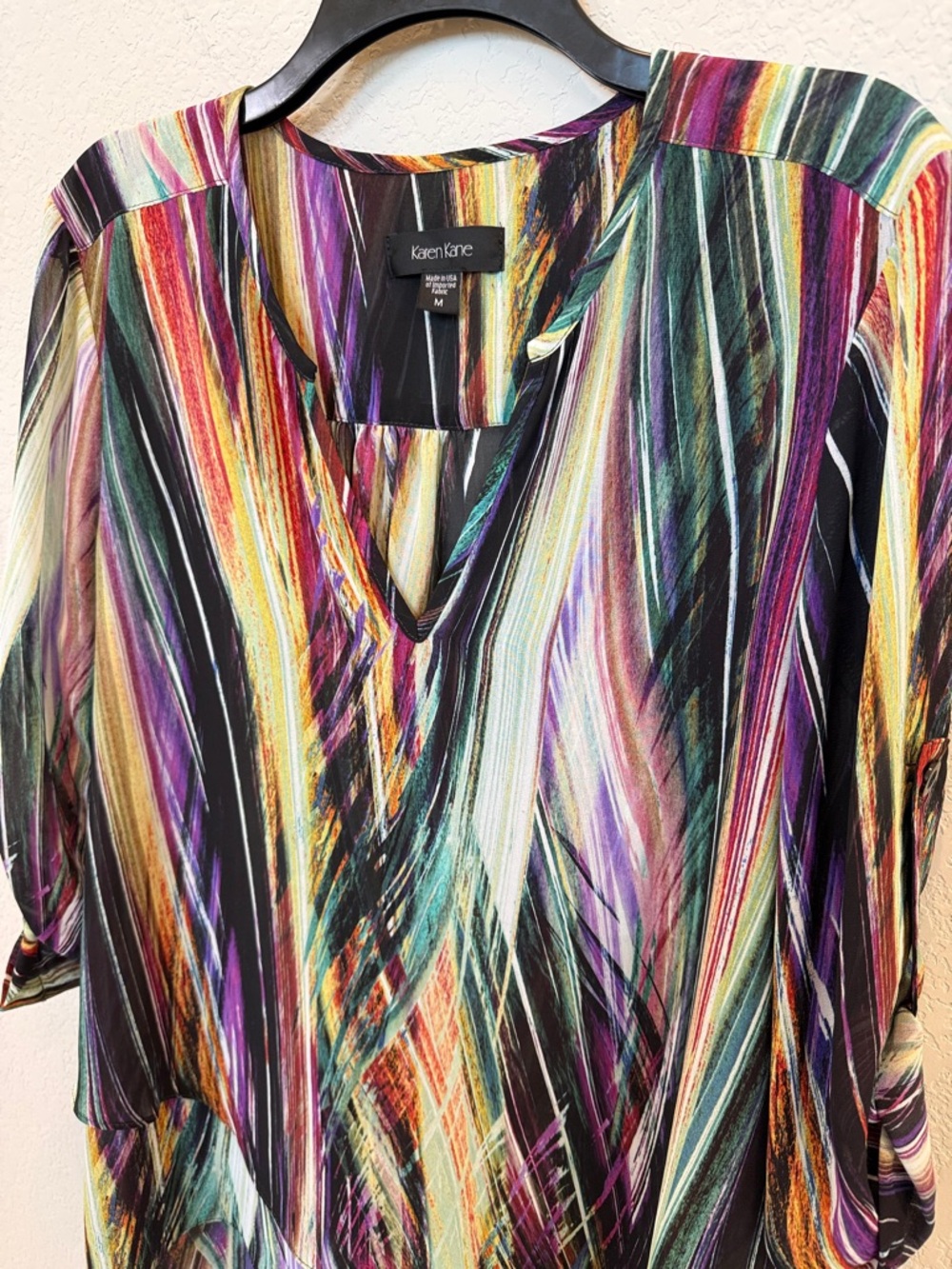 Karen Kane Abstract Stripe Asymmetric Wrap Blouse.